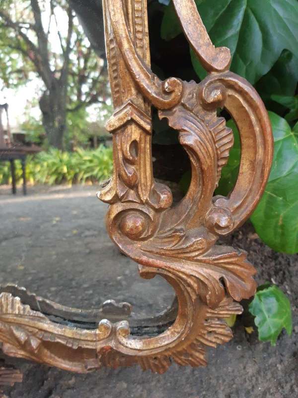 Gilt And Carved Wooden Mirror