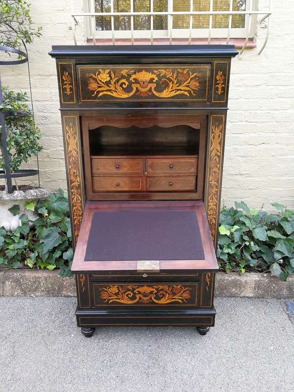 A Late 19th Century Dutch Marquetry And Ebonised Secrétaire À Abbatant, Enclosing A Baize-Lined...
