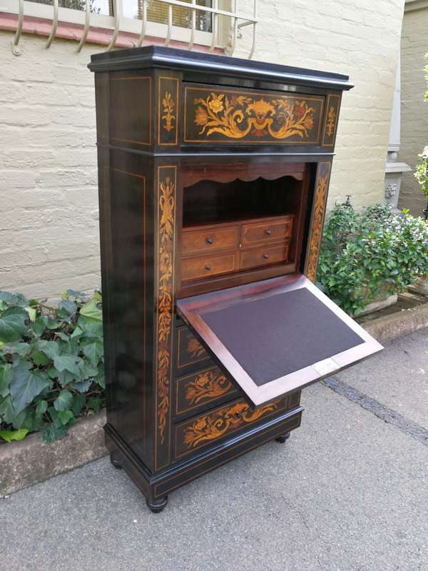 A Late 19th Century Dutch Marquetry And Ebonised Secrétaire À Abbatant, Enclosing A Baize-Lined...