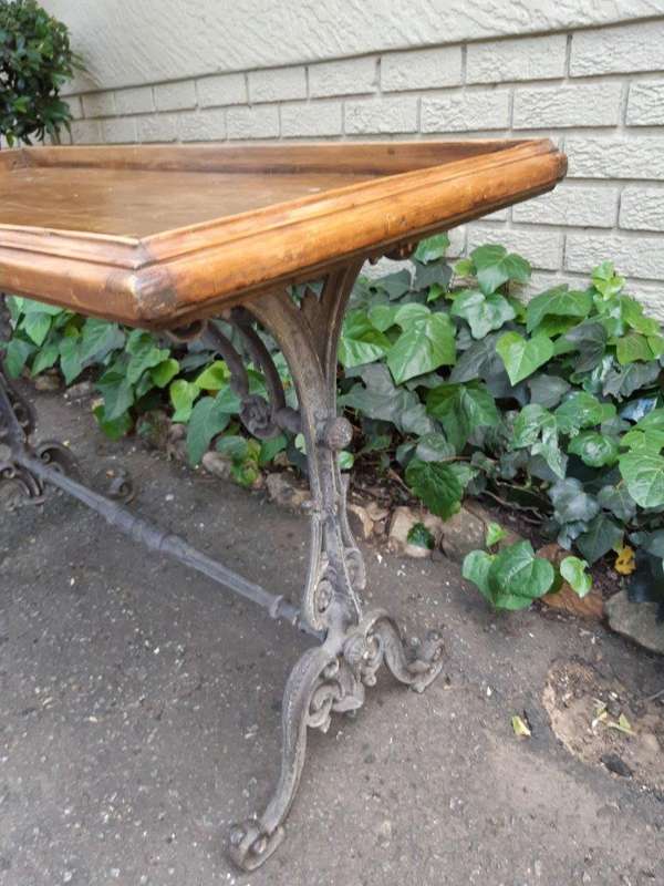 A Victorian Cast-Iron And Pine Table