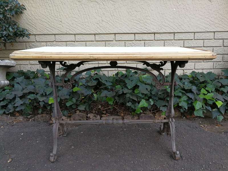 A Victorian Cast-Iron And Bleached / Natural Pine Table with marble top ND
