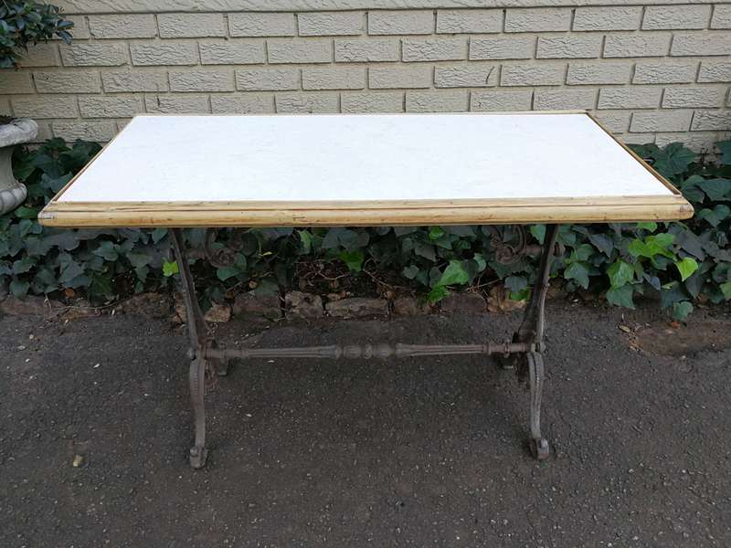 A Victorian Cast-Iron And Bleached / Natural Pine Table with marble top ND