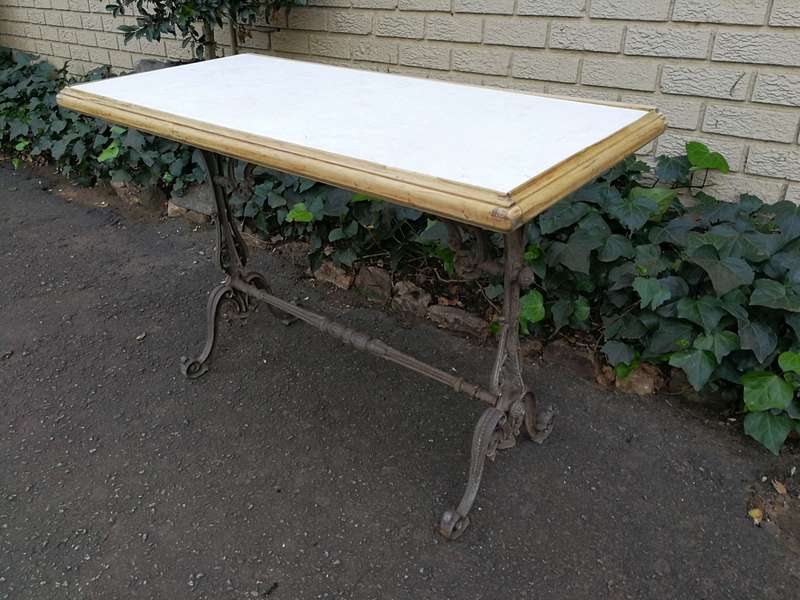 A Victorian Cast-Iron And Bleached / Natural Pine Table with marble top ND