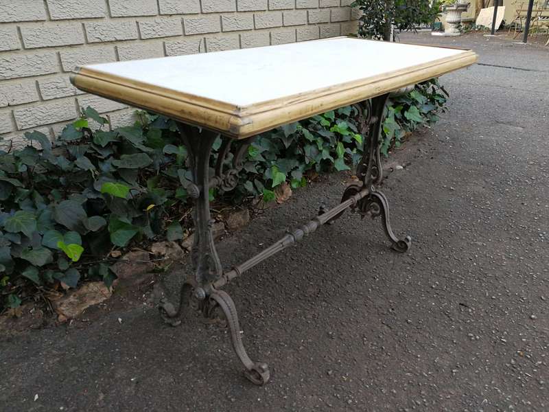 A Victorian Cast-Iron And Bleached / Natural Pine Table with marble top ND