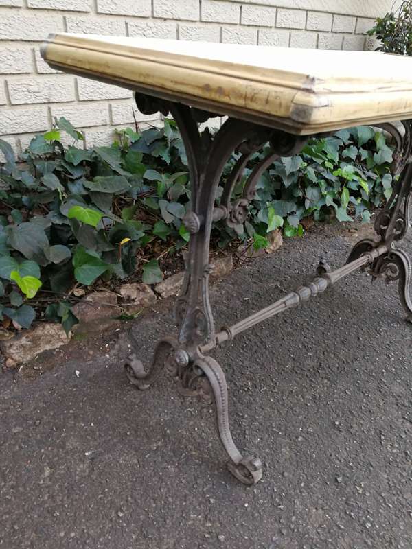 A Victorian Cast-Iron And Bleached / Natural Pine Table with marble top ND