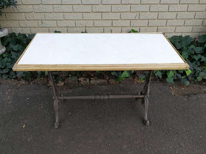 A Victorian Cast-Iron And Bleached / Natural Pine Table with marble top ND