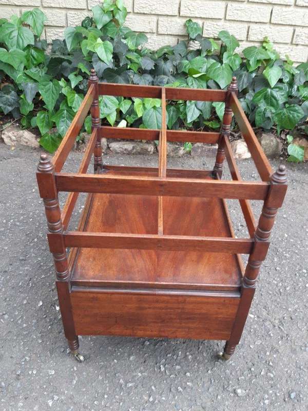 A Circa 1820 Regency Mahogany Canterbury With Drawers and Brass Casters