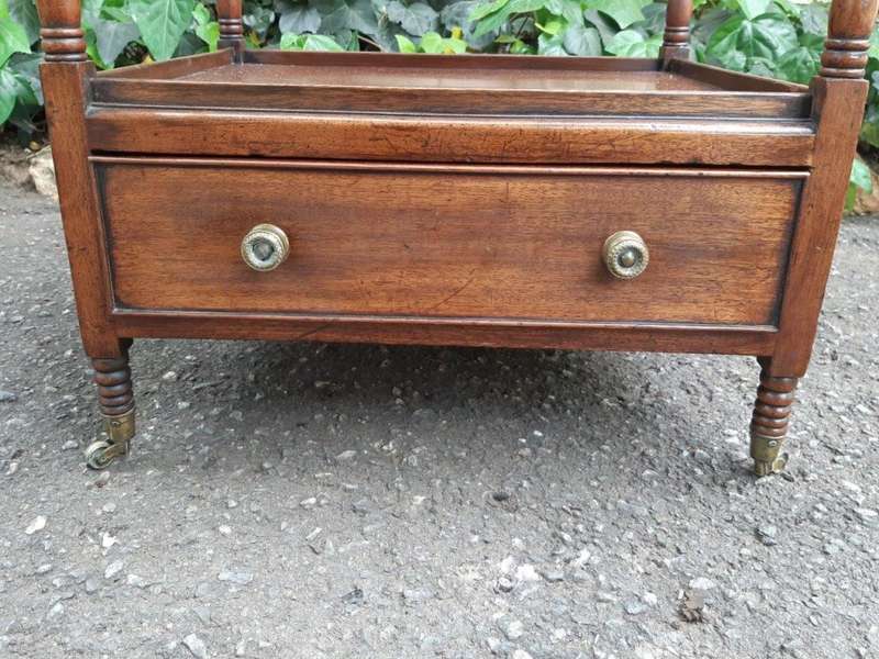 A Circa 1820 Regency Mahogany Canterbury With Drawers and Brass Casters