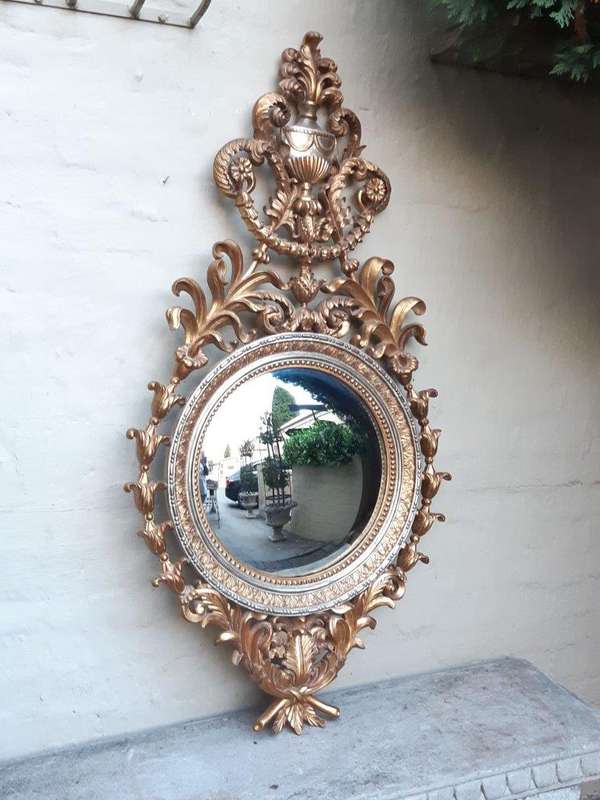 A Gilt Convex Mirror (Continental)