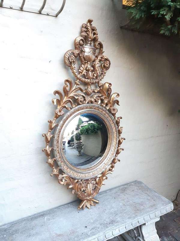 A Gilt Convex Mirror (Continental)