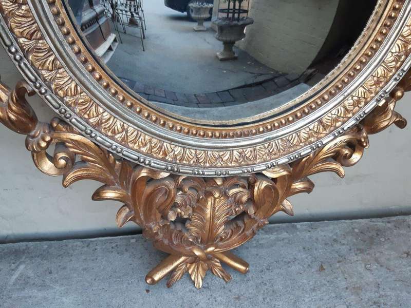 A Gilt Convex Mirror (Continental)