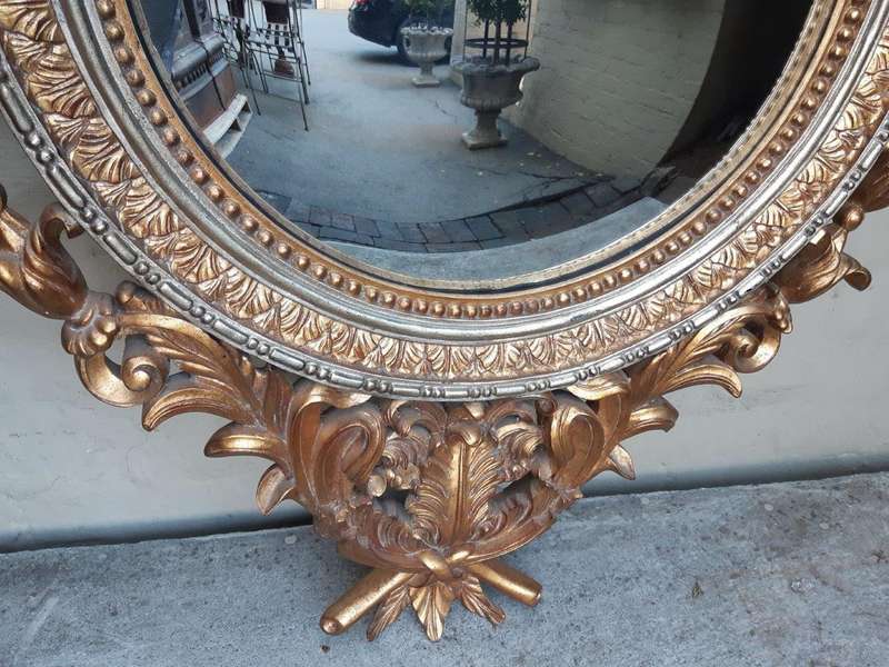 A Gilt Convex Mirror (Continental)