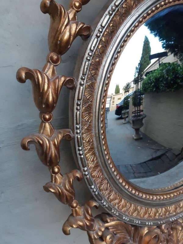 A Gilt Convex Mirror (Continental)