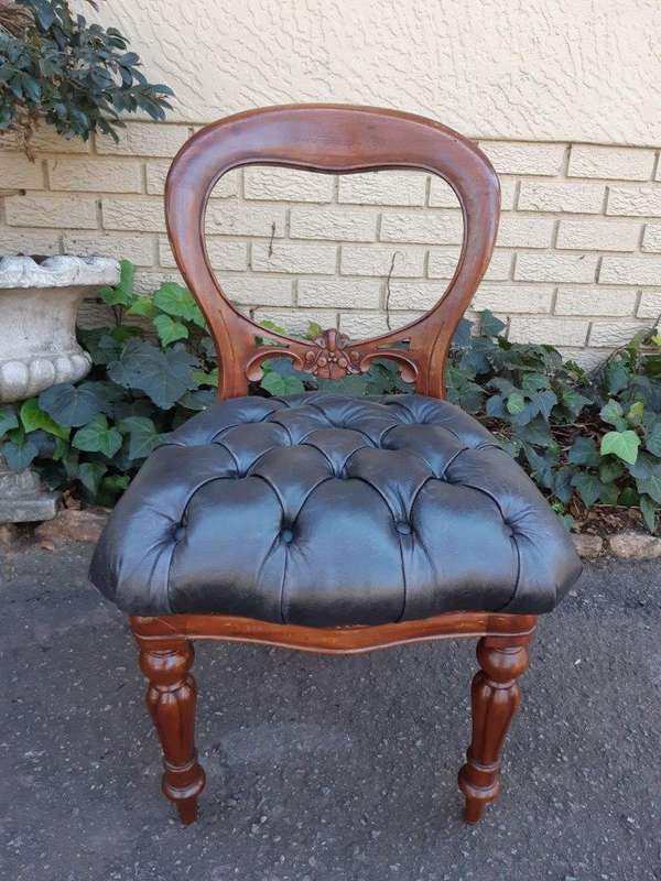 A 20TH Century Set of Twelve Victorian Style Mahogany Bustle Back Dining Chairs Upholstered in De...