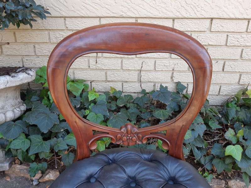 A 20TH Century Set of Twelve Victorian Style Mahogany Bustle Back Dining Chairs Upholstered in De...