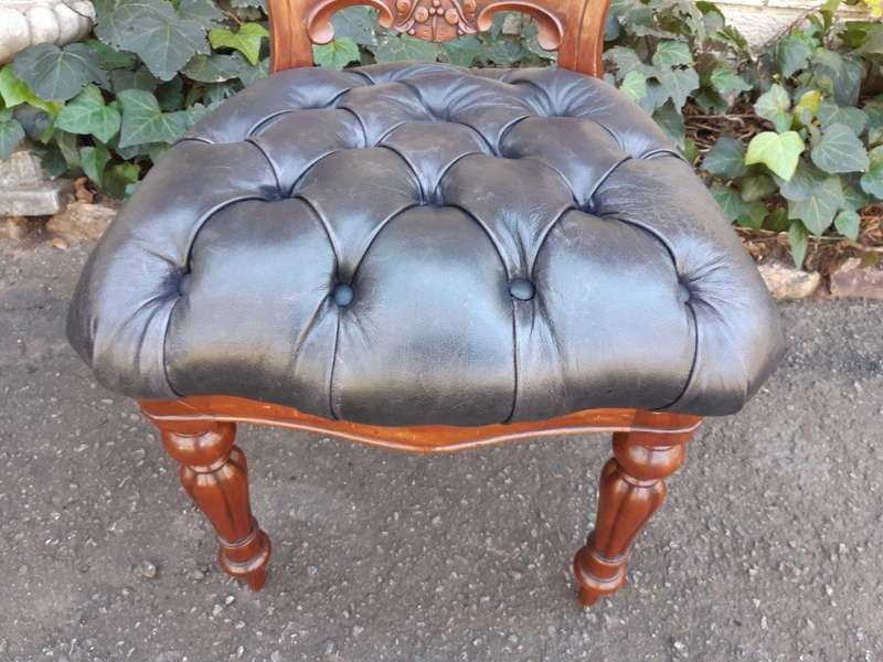 A 20TH Century Set of Twelve Victorian Style Mahogany Bustle Back Dining Chairs Upholstered in De...
