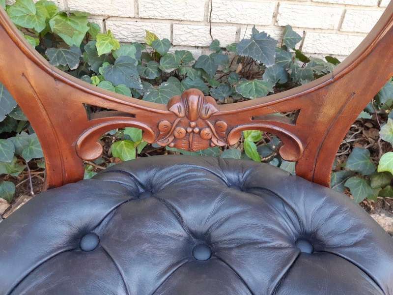 A 20TH Century Set of Twelve Victorian Style Mahogany Bustle Back Dining Chairs Upholstered in De...