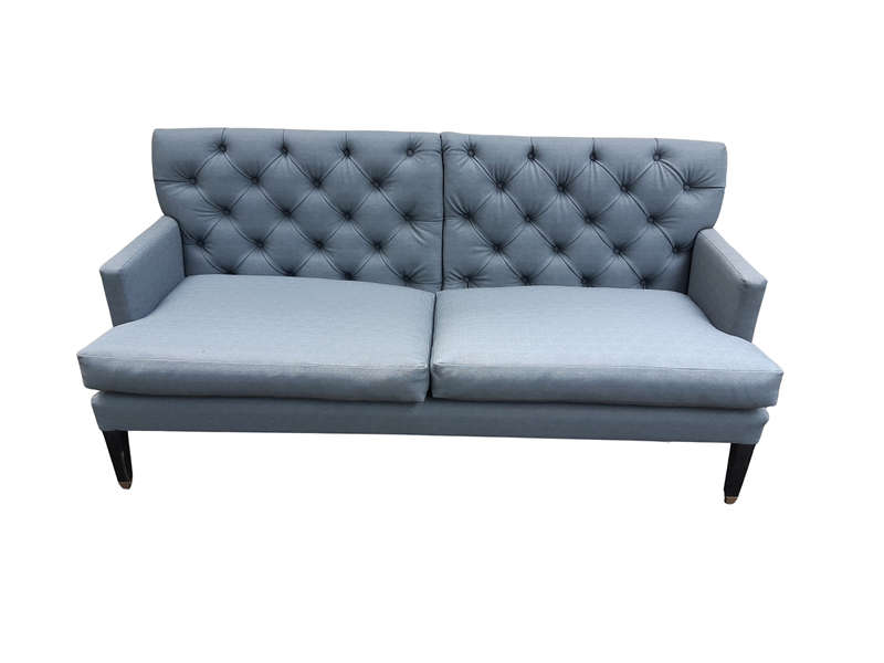 A Designer Sofa in a Grey Imported Waterproof and Stain Resistant Fabric. Condition is as new.