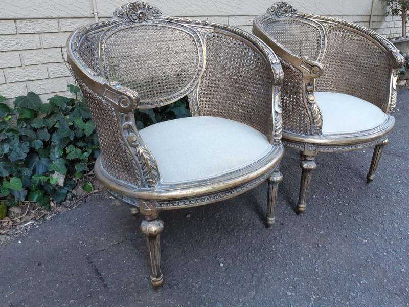 A Pair Of Gilded Rattan Arm/Bergere Style Chairs