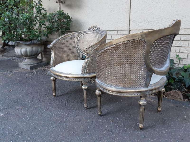 A Pair Of Gilded Rattan Arm/Bergere Style Chairs