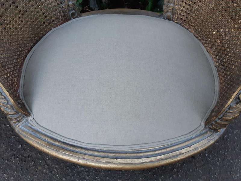 A Pair Of Gilded Rattan Arm/Bergere Style Chairs
