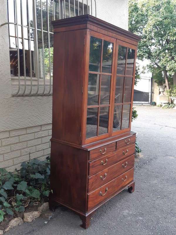 A Georgian Mahogany Bookcase on Chest with Slide-in Shelves & Original Brass Hardware on Bracket ...