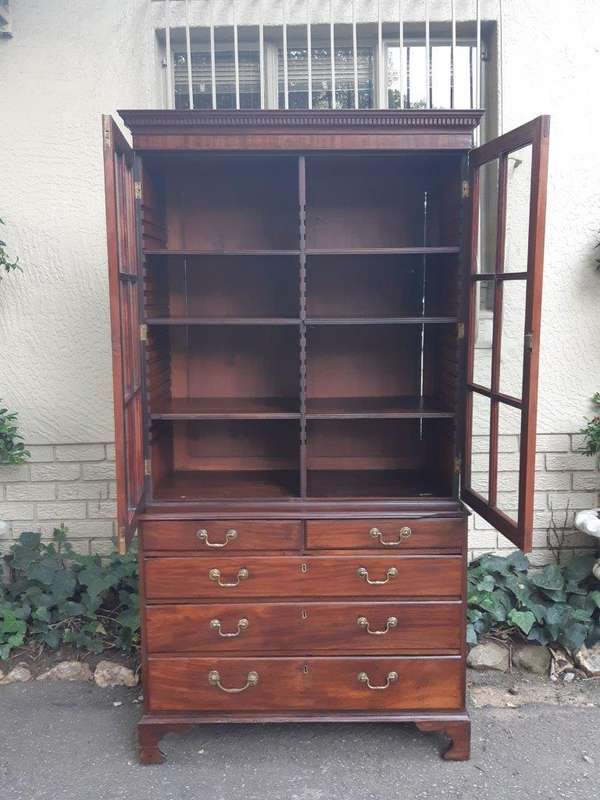 A Georgian Mahogany Bookcase on Chest with Slide-in Shelves & Original Brass Hardware on Bracket ...