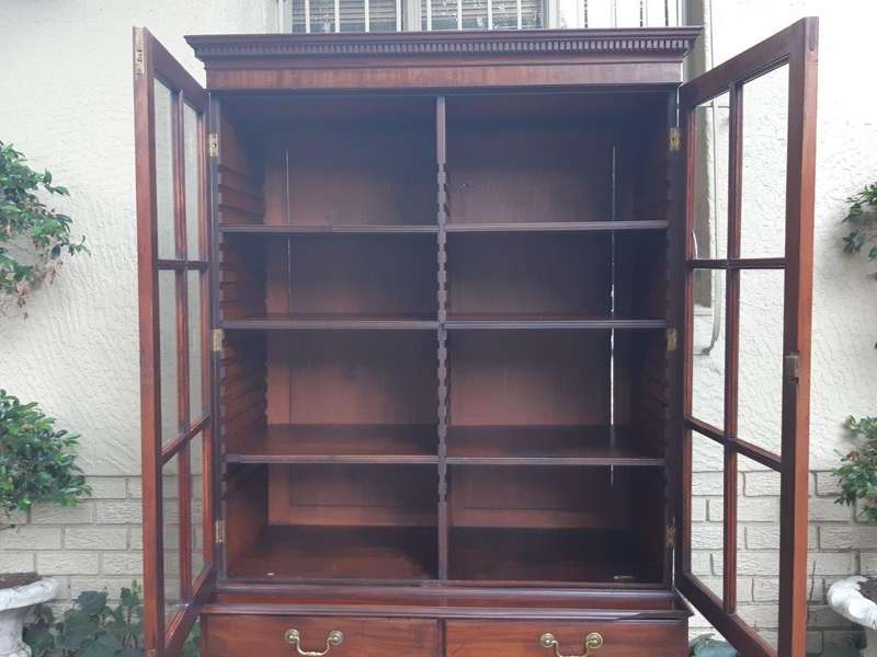 A Georgian Mahogany Bookcase on Chest with Slide-in Shelves & Original Brass Hardware on Bracket ...