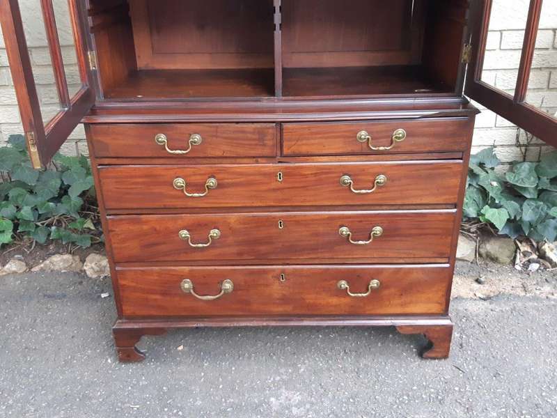 A Georgian Mahogany Bookcase on Chest with Slide-in Shelves & Original Brass Hardware on Bracket ...