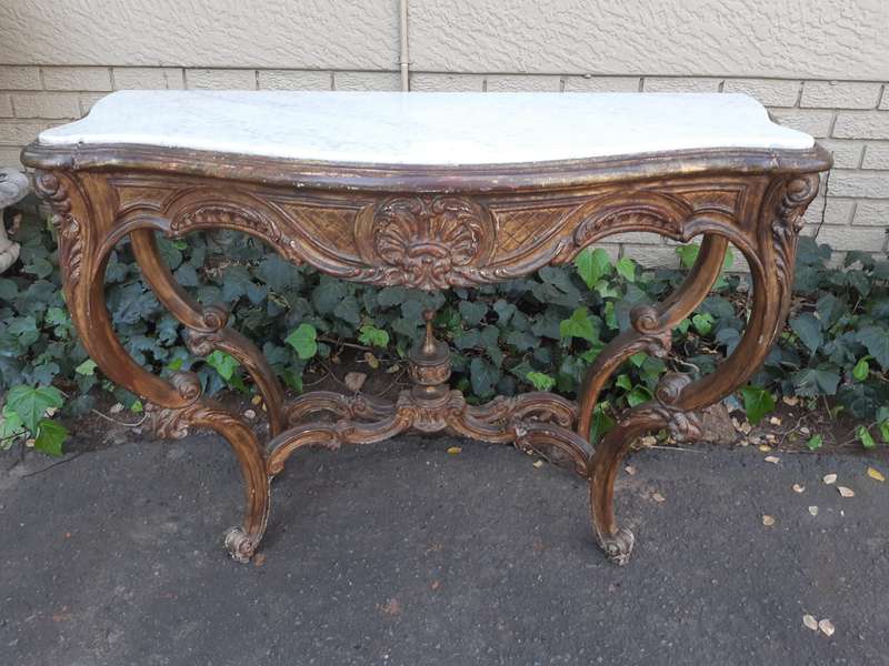 A 19th century French giltwood and marble-topped console table