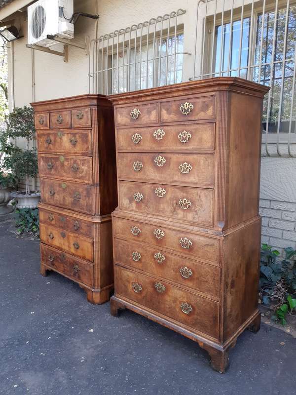 A NEAR PAIR of George III Burr walnut chest-on-chests