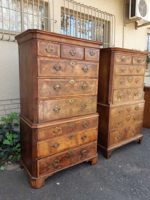 A NEAR PAIR of George III Burr walnut chest-on-chests