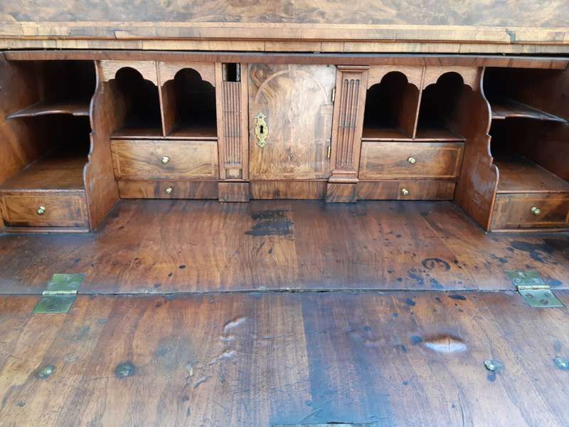 A NEAR PAIR of George III Burr walnut chest-on-chests