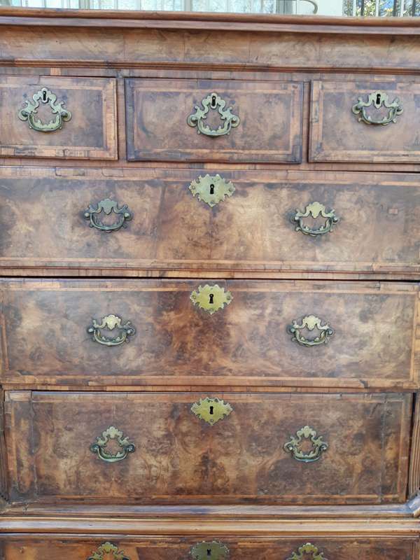 A NEAR PAIR of George III Burr walnut chest-on-chests
