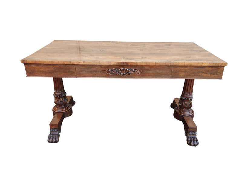 A William IV Rosewood Library Table With Brass Castors
