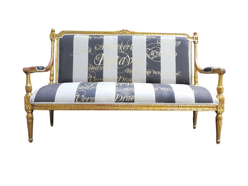 A 20th Century French Style Ornate Hand-Carved and Gilded Settee / Sofa Upholstered in a Custom-m...