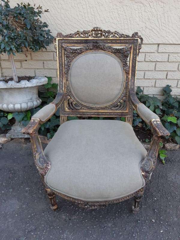 A 20th Century Pair (over 80 years old) of French Style Ornately Carved and Gilded Arm Chairs Uph...