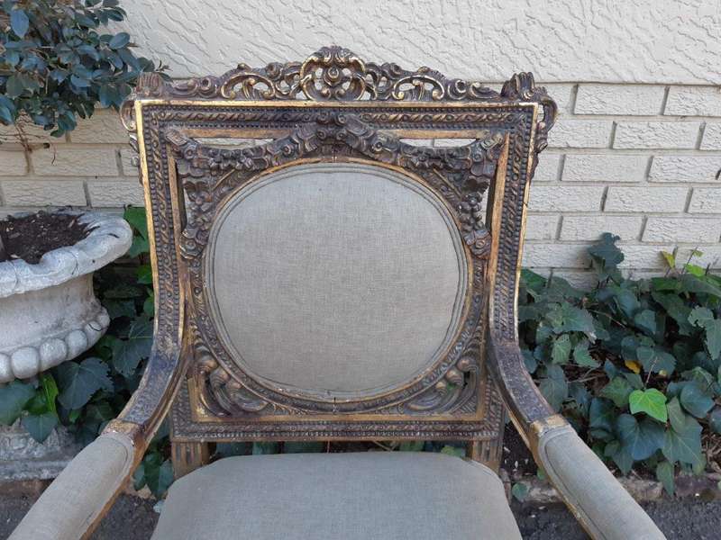 A 20th Century Pair (over 80 years old) of French Style Ornately Carved and Gilded Arm Chairs Uph...