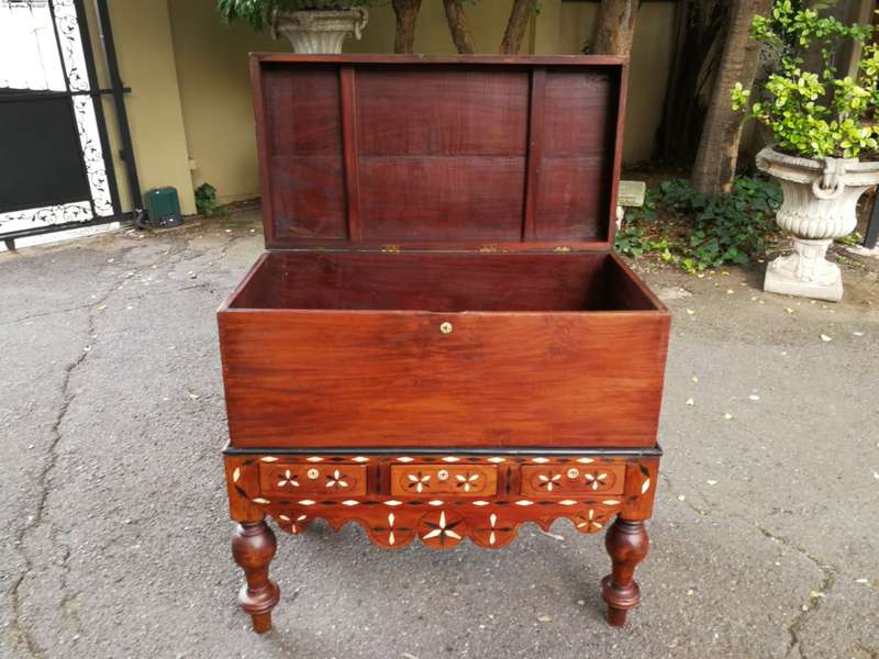An Anglo Indian Burmese Teak Chest on Stand with Ebony Inlay. Circa 1880