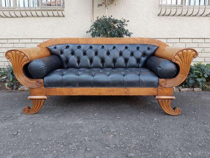 A Biedermeier Settee Covered in Leather and Deep Buttoned Circa Early 20th Century