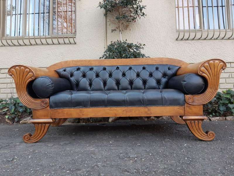 A Biedermeier Settee Covered in Leather and Deep Buttoned Circa Early 20th Century
