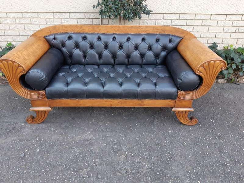 A Biedermeier Settee Covered in Leather and Deep Buttoned Circa Early 20th Century