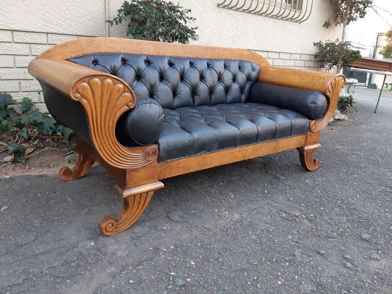 A Biedermeier Settee Covered in Leather and Deep Buttoned Circa Early 20th Century