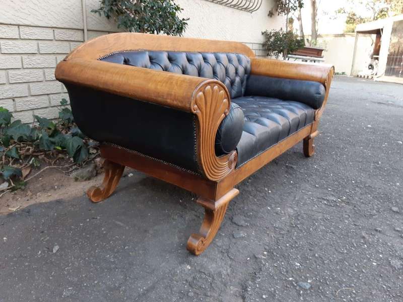 A Biedermeier Settee Covered in Leather and Deep Buttoned Circa Early 20th Century