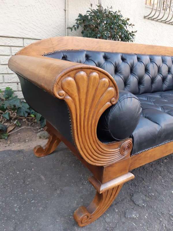 A Biedermeier Settee Covered in Leather and Deep Buttoned Circa Early 20th Century