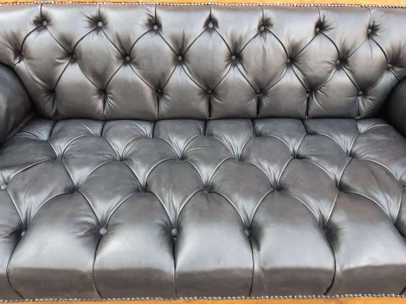 A Biedermeier Settee Covered in Leather and Deep Buttoned Circa Early 20th Century
