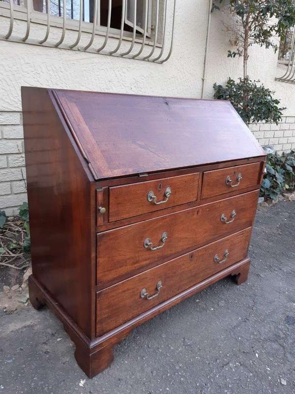 A George lll Mahogany Bureau with Gilt-Tooled Leather Writing Surface