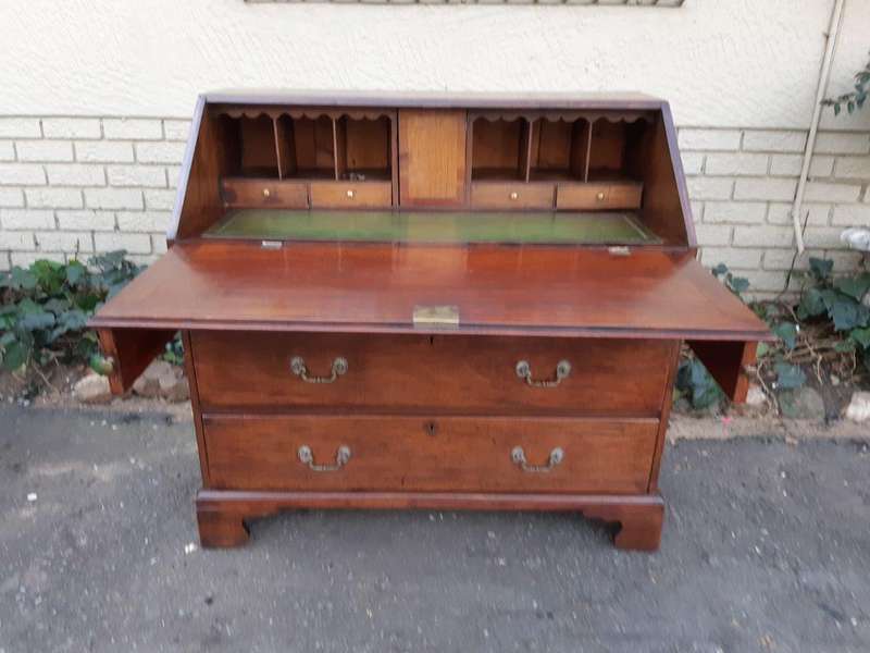 A George lll Mahogany Bureau with Gilt-Tooled Leather Writing Surface