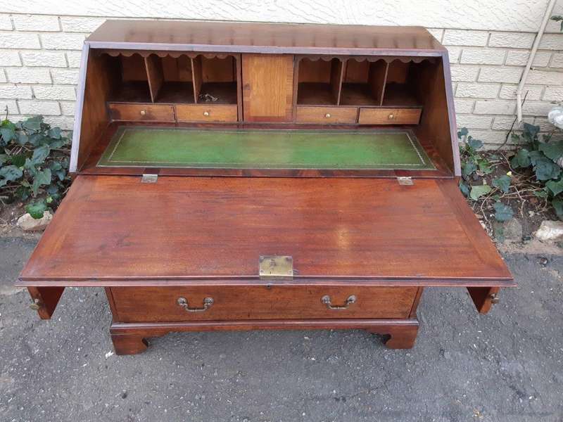 A George lll Mahogany Bureau with Gilt-Tooled Leather Writing Surface