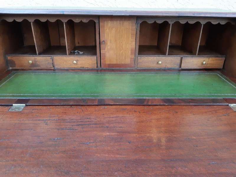 A George lll Mahogany Bureau with Gilt-Tooled Leather Writing Surface